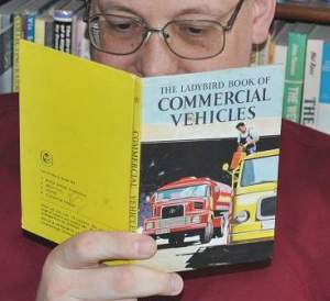 Phil reading the LadyBird Book of Commercial Vehciles. A first edition too !